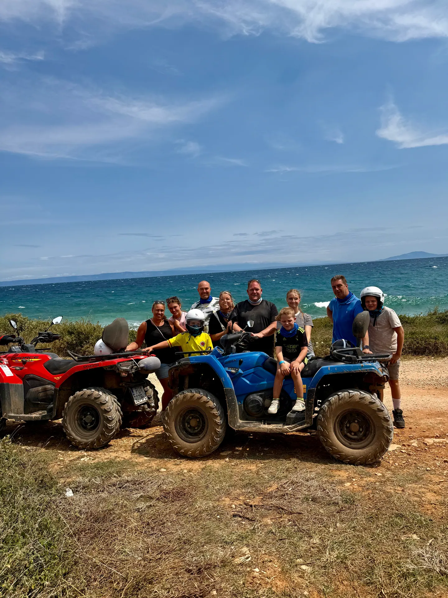 Guests on blue quads by the sea near Medulin