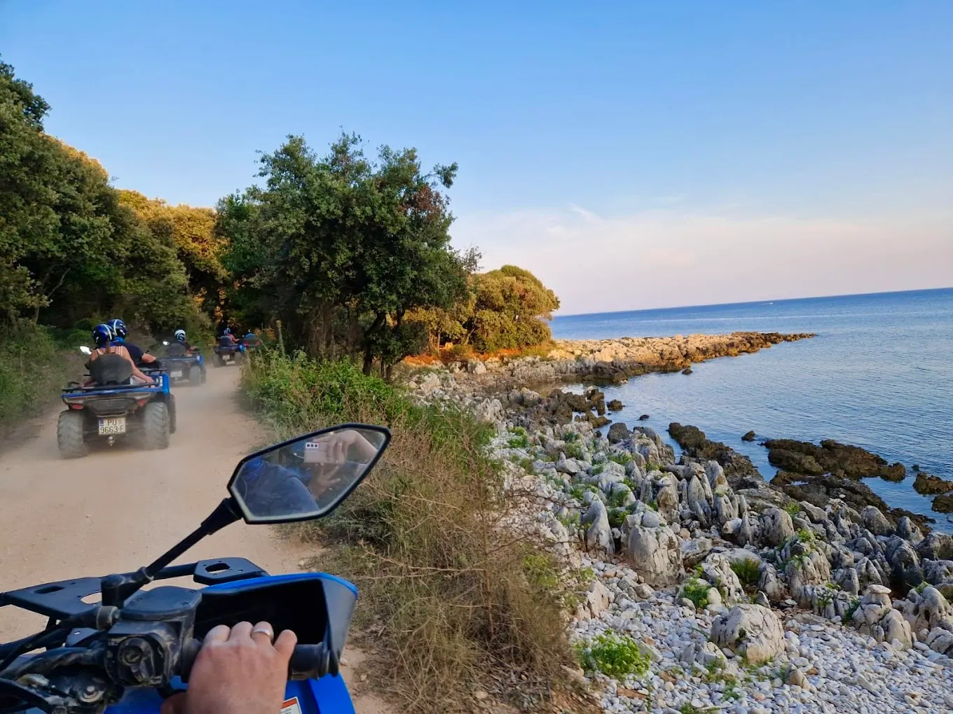 Blue ATV quads on a guided coastal tour in Istria